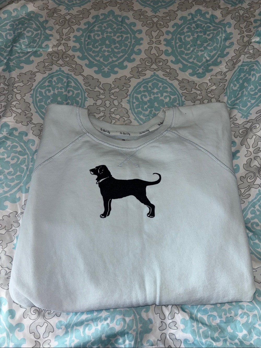 The black dog sweater
